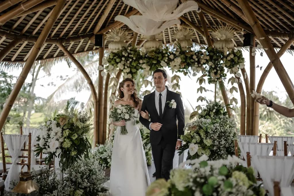 Couple walking back down the aisle after the ceremony